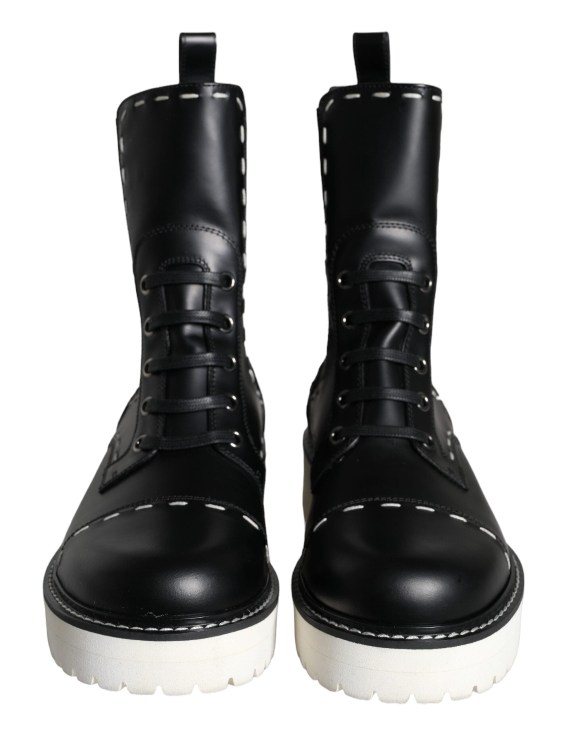 Bottes noires en cuir Dolce & Gabbana, mi-mollet, style combat, avec boucle et semelle en caoutchouc.