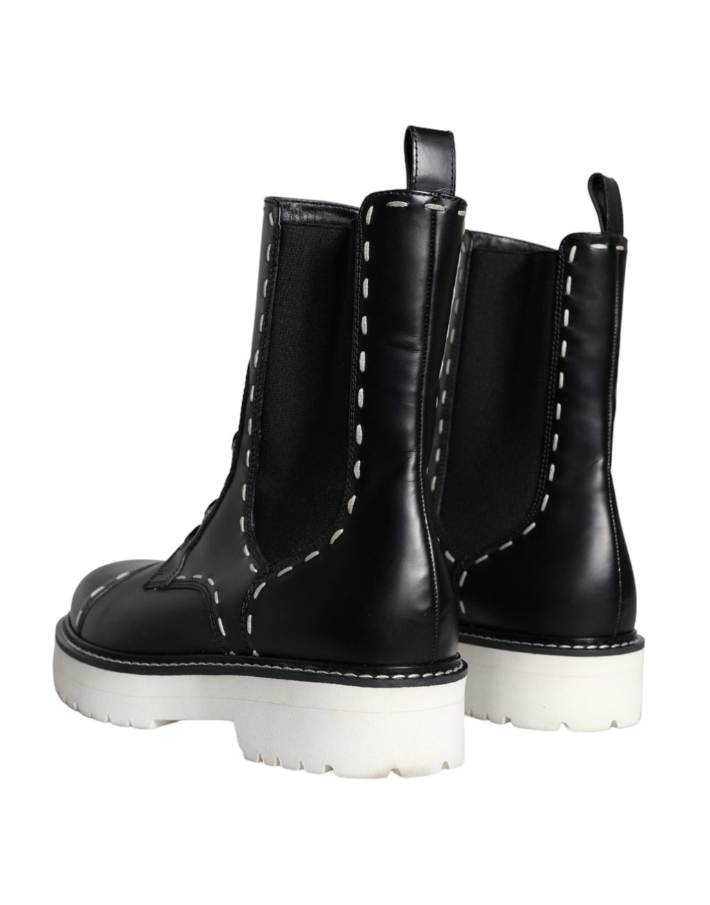 Bottes marron en cuir noir Dolce & Gabbana, combat mi-mollet, avec semelle robuste et détails élégants, chaussures tendance et sophistiquées.