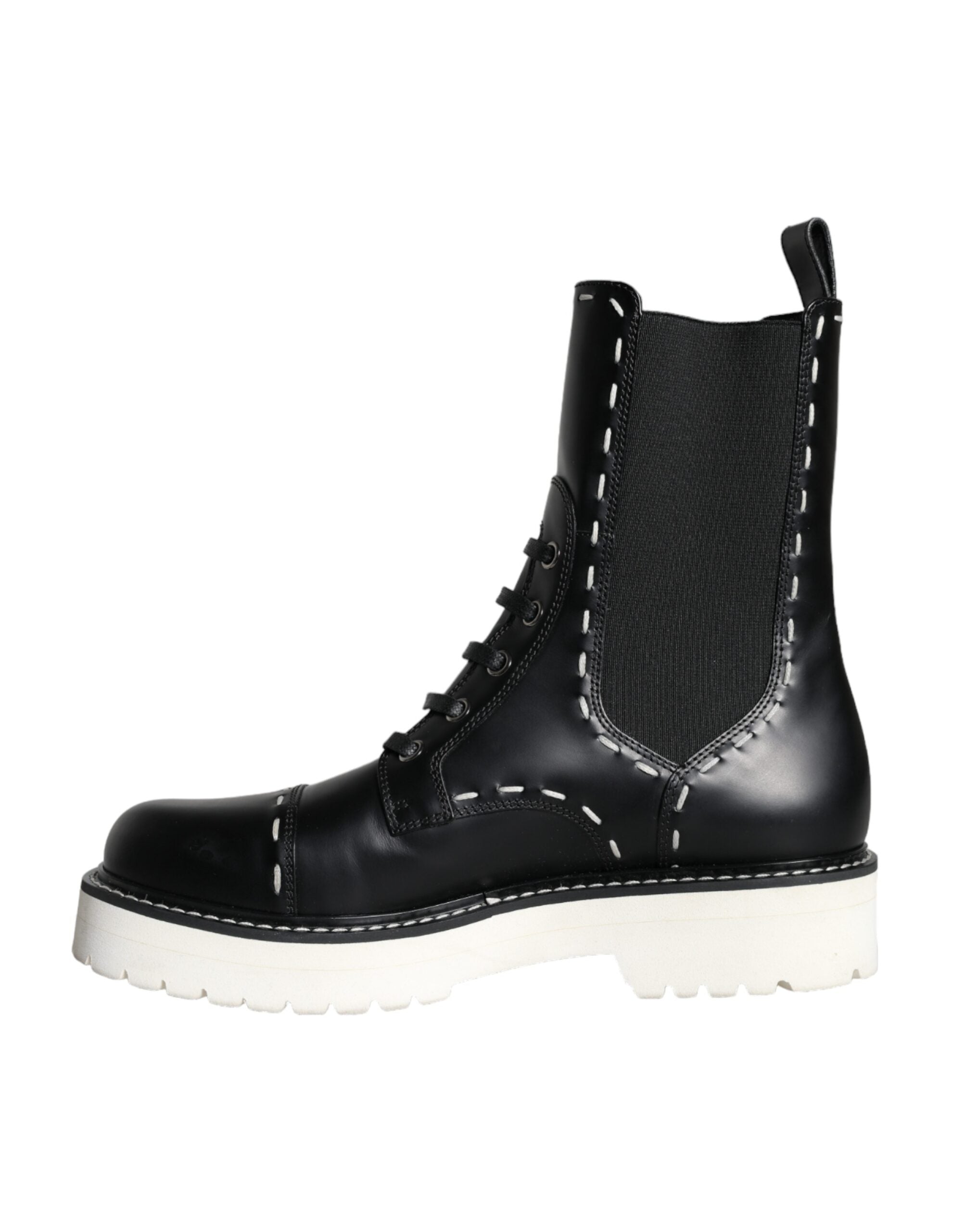 Bottes combat en cuir noir Dolce & Gabbana mi-mollet, style robuste et élégant, vues de face.