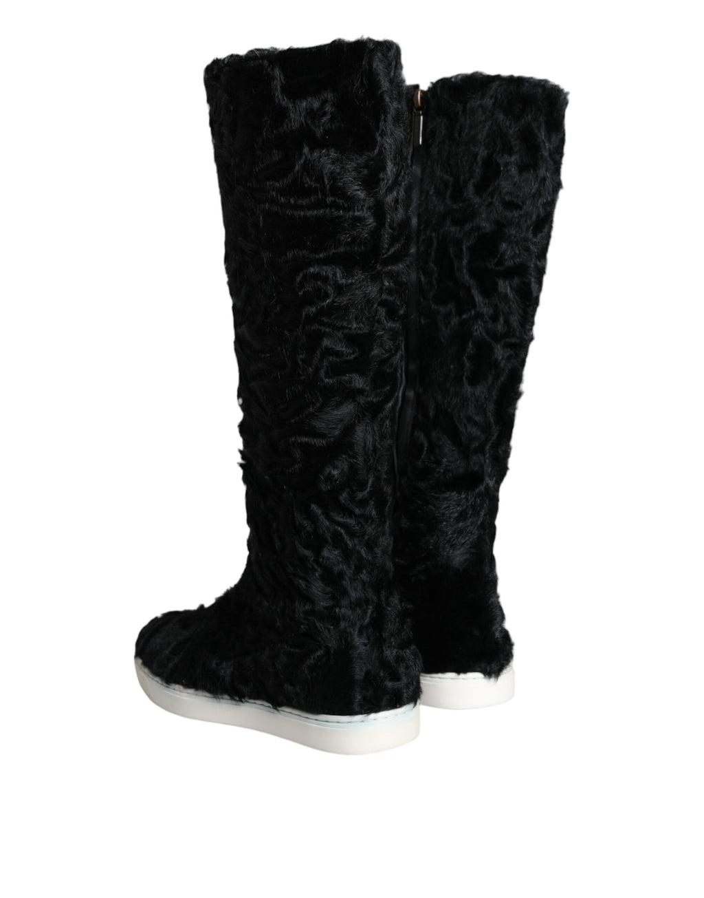 Bottes en cuir et fourrure de mouton noir Dolce & Gabbana Xiangao, élégantes et sophistiquées, visibles sur l'image.