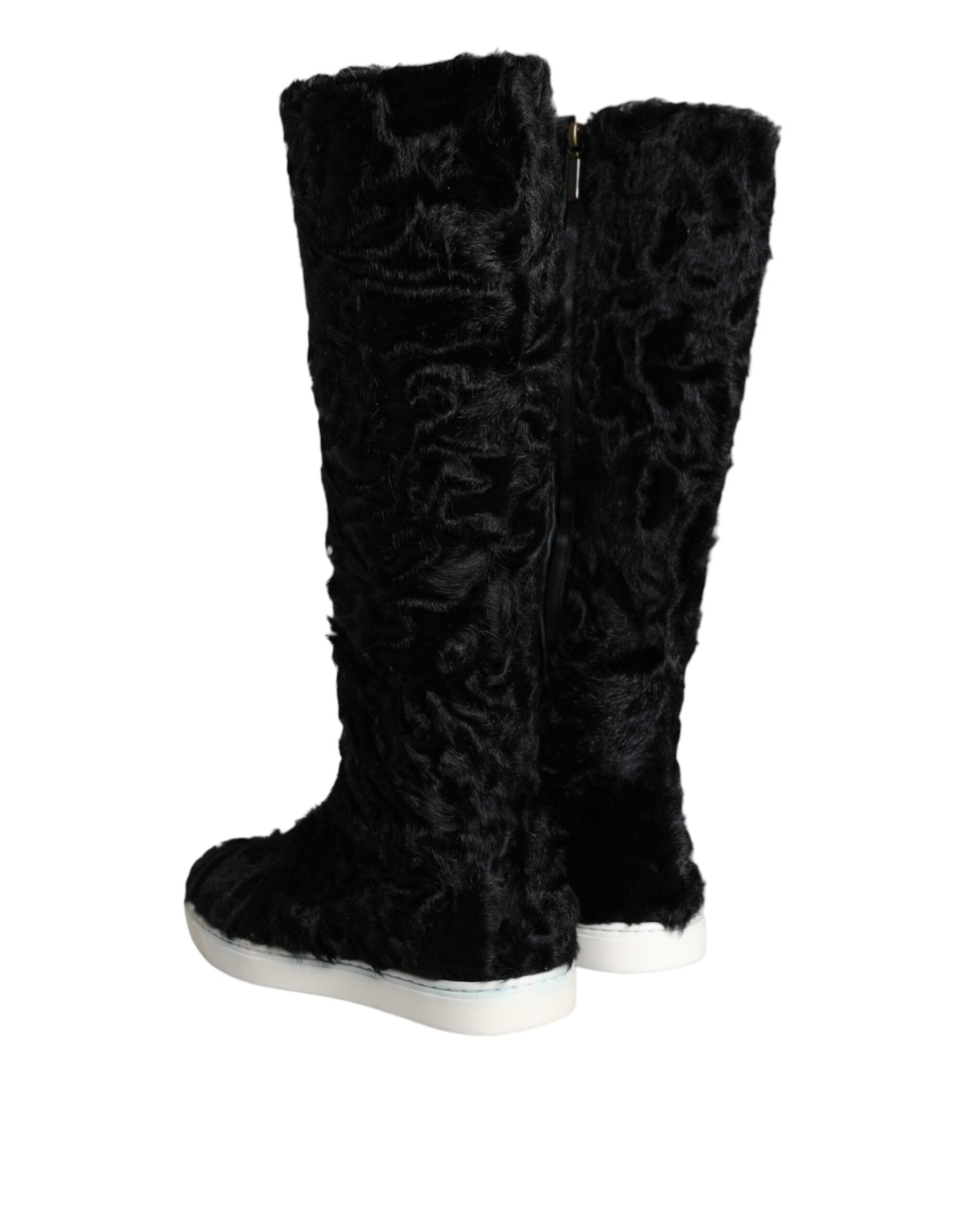 Bottes en cuir et fourrure de mouton noir Dolce & Gabbana Xiangao, élégantes et sophistiquées, visibles sur l'image.