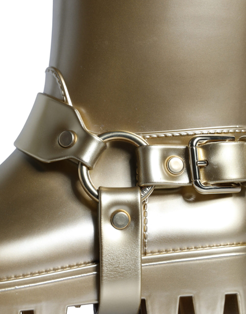Bottes de pluie en caoutchouc et PVC doré métallisé de Dolce & Gabbana, style élégant et brillant.