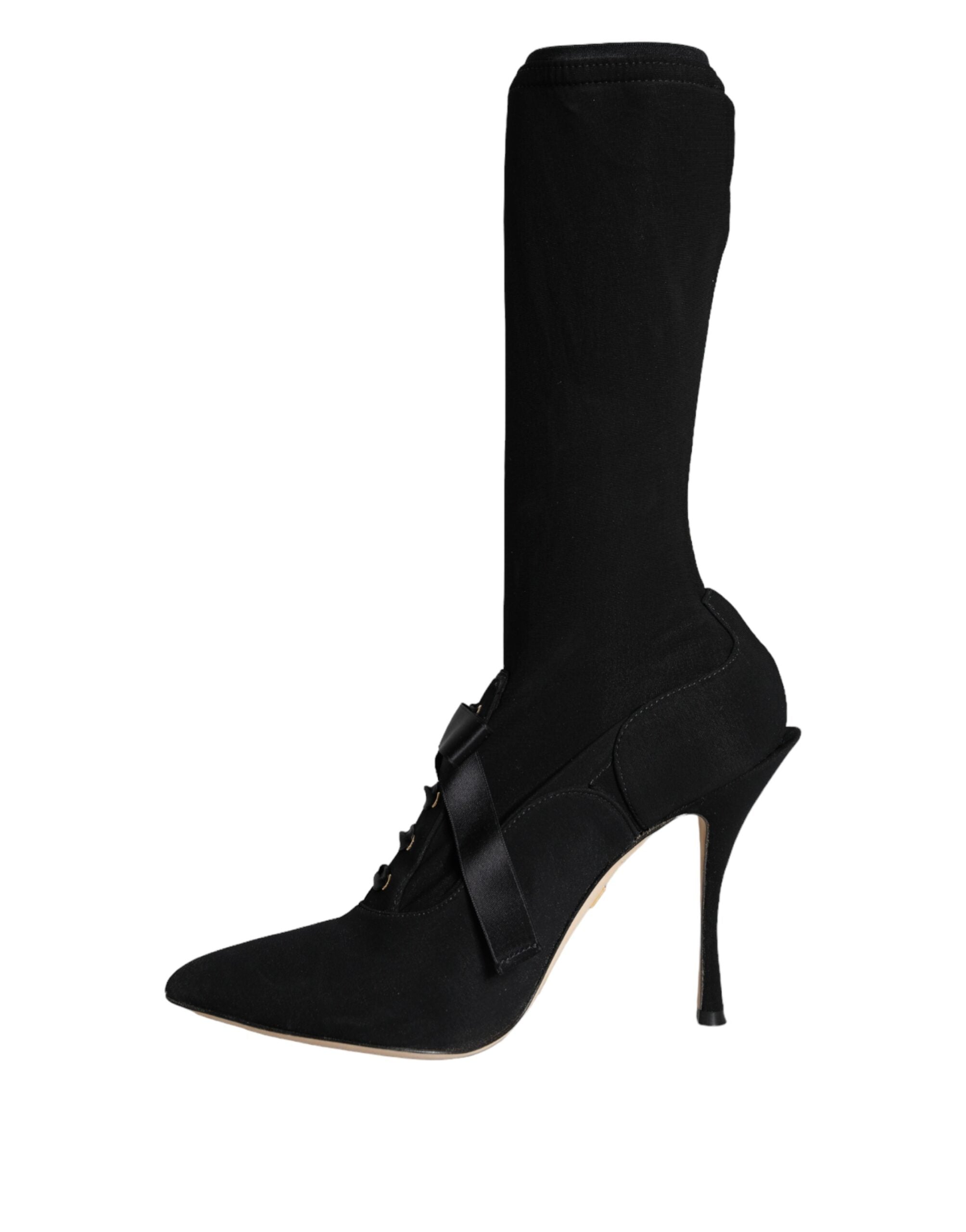 Chaussures Dolce & Gabbana à talons aiguilles noirs, bottines mi-mollet élégantes en cuir, vue de face avec détails de finition.