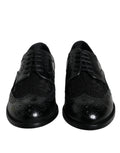 Chaussures formelles Dolce & Gabbana en cuir noir avec détails en dentelle florale.