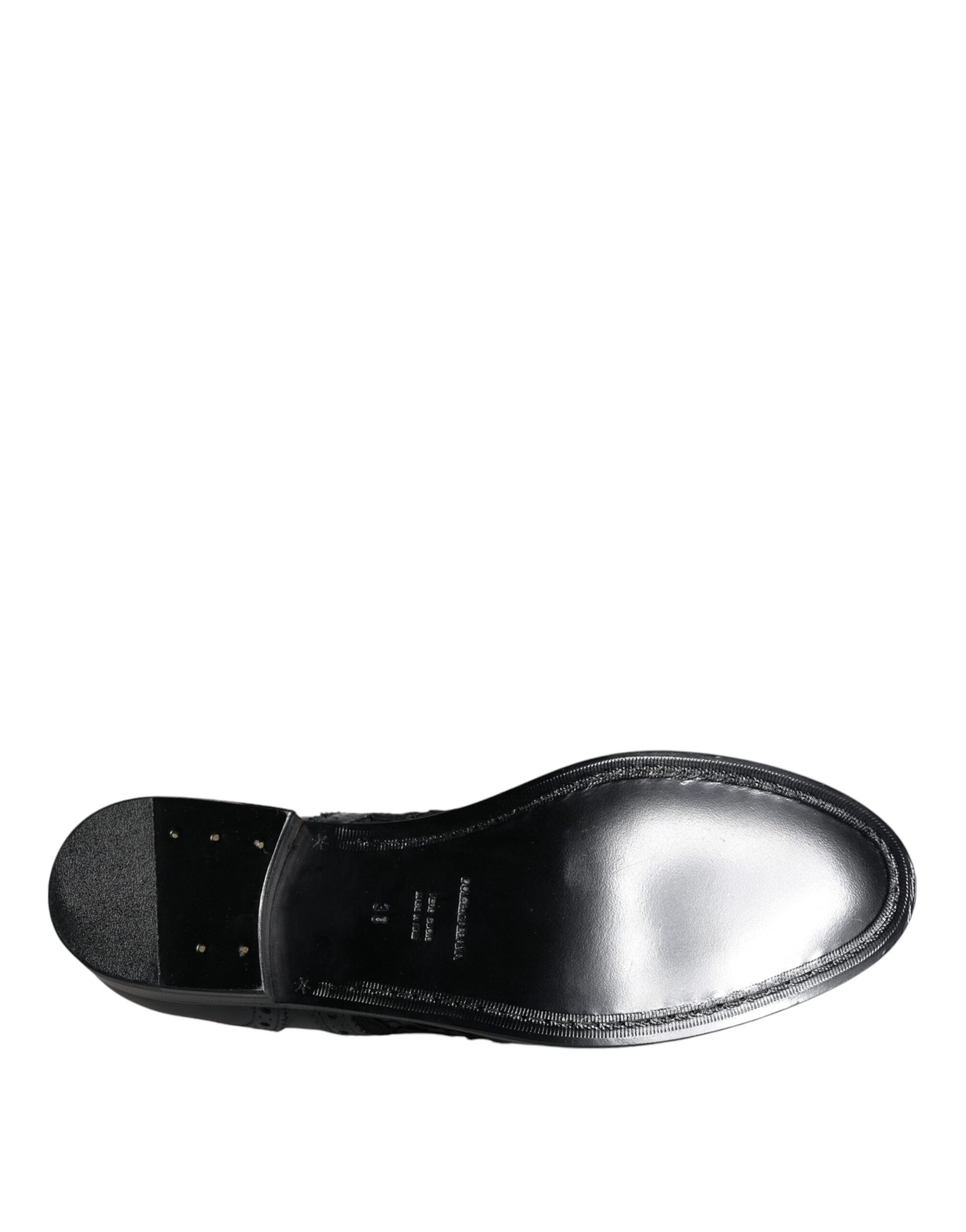 Chaussures formelles Dolce & Gabbana en cuir noir avec dentelle florale, élégantes pour occasions spéciales.