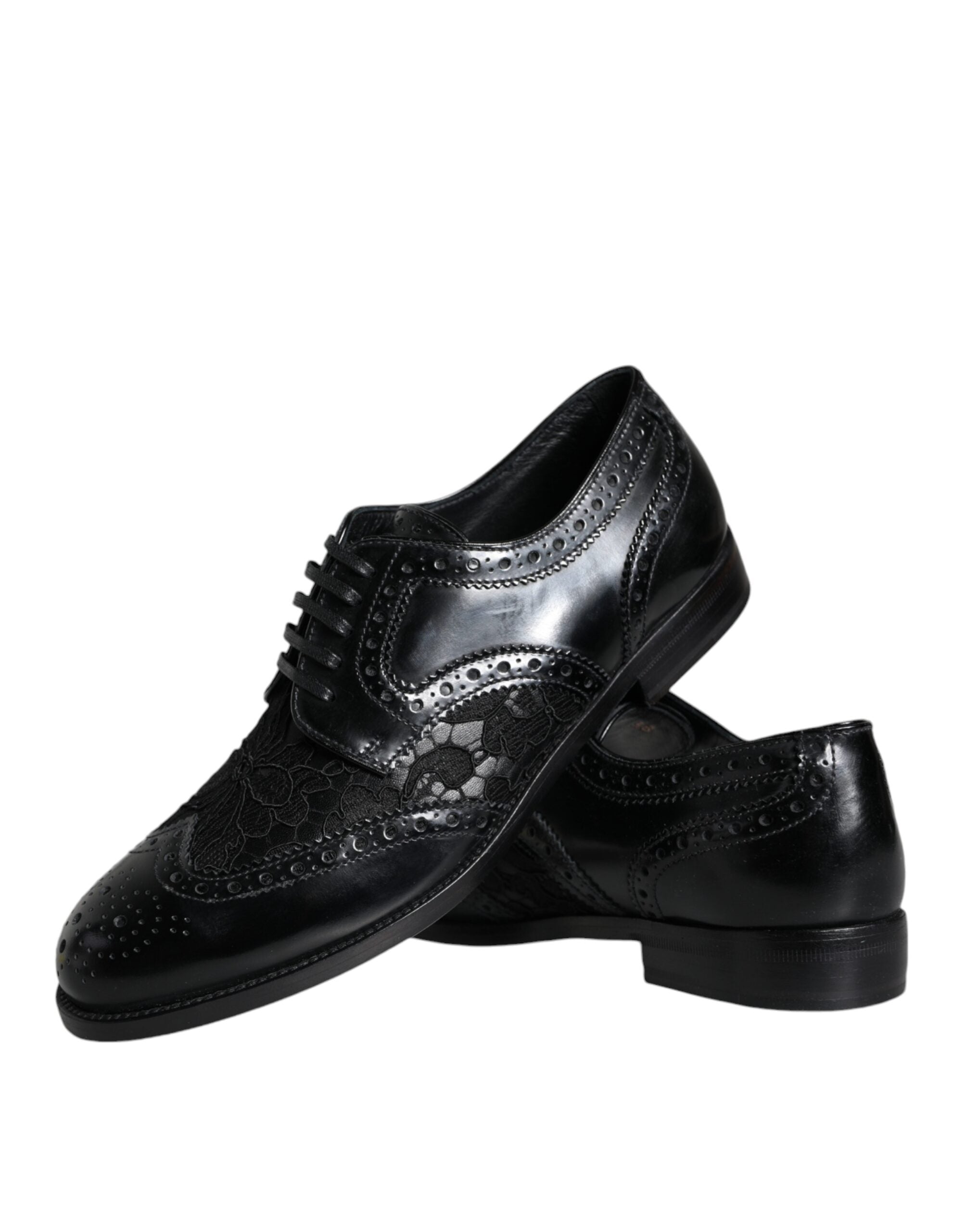 Chaussures formelles Dolce & Gabbana en cuir noir avec détails floraux en dentelle, élégantes et sophistiquées.