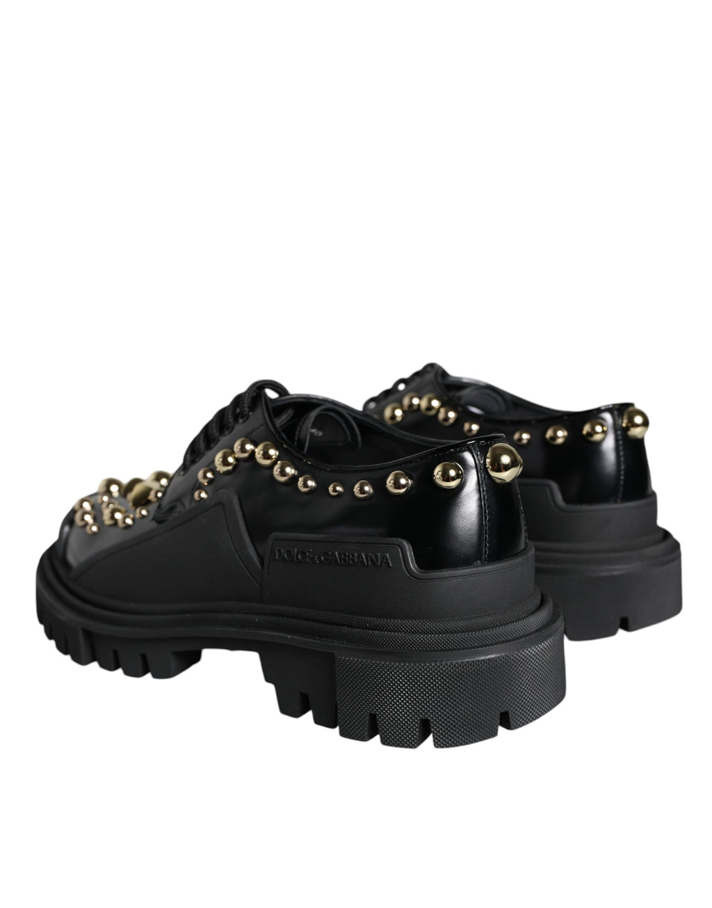 Chaussures de randonnée Derby en cuir noir Dolce & Gabbana avec embellissements, style élégant et robuste.