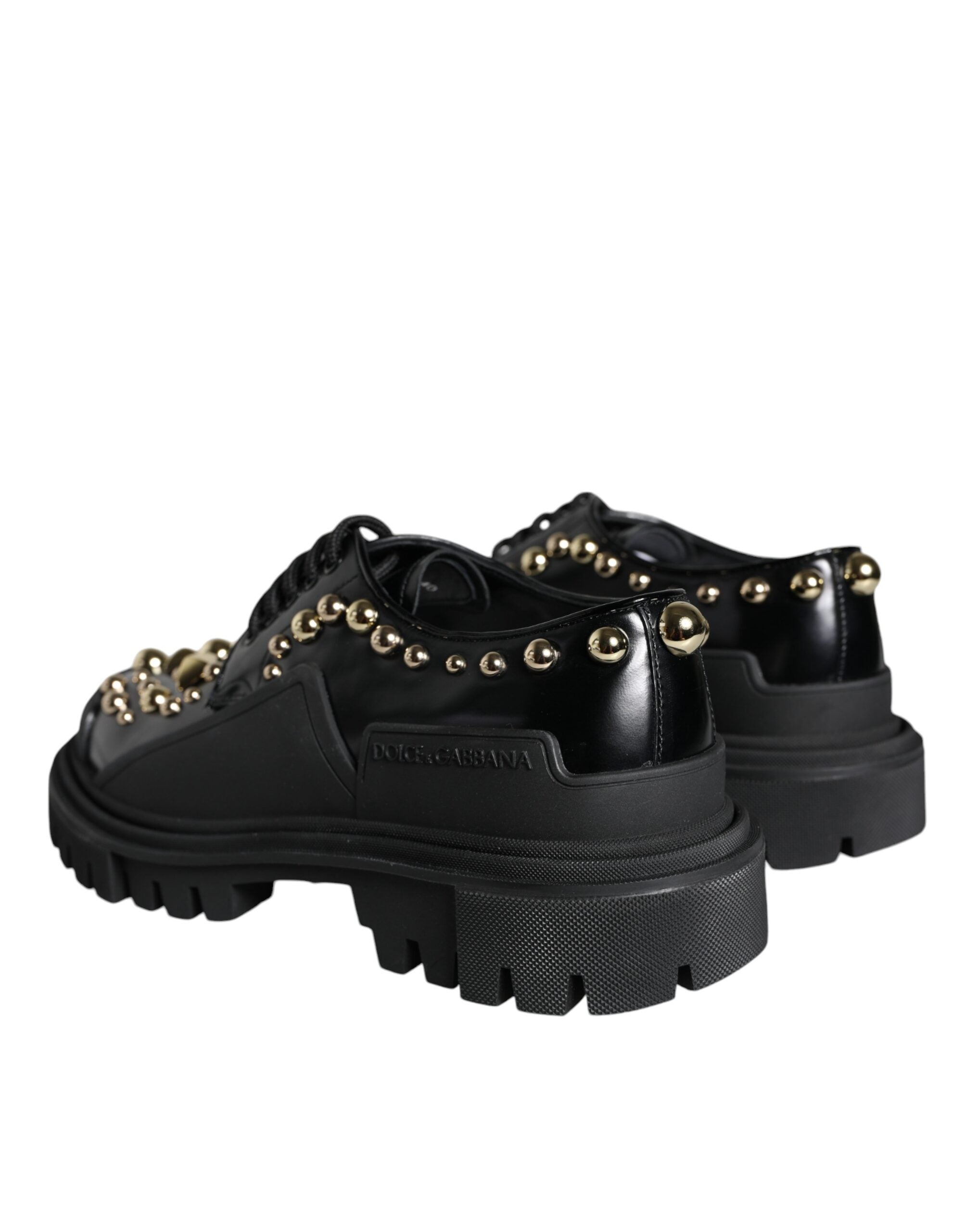 Chaussures de randonnée Derby en cuir noir Dolce & Gabbana avec embellissements, style élégant et robuste.