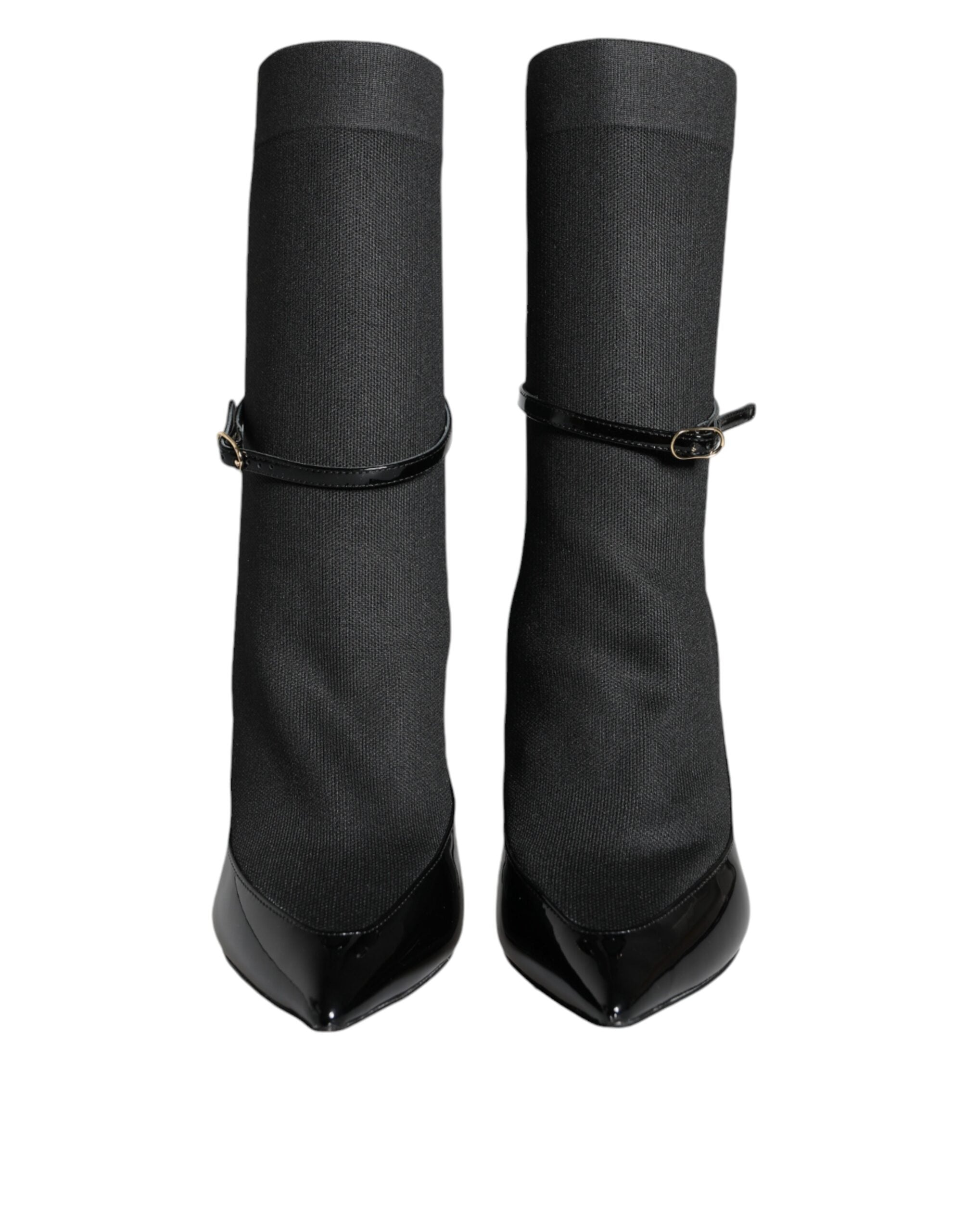 Chaussures Dolce & Gabbana en cuir noir, bottines stilettos avec chaussettes intégrées, vue de face sur fond blanc.