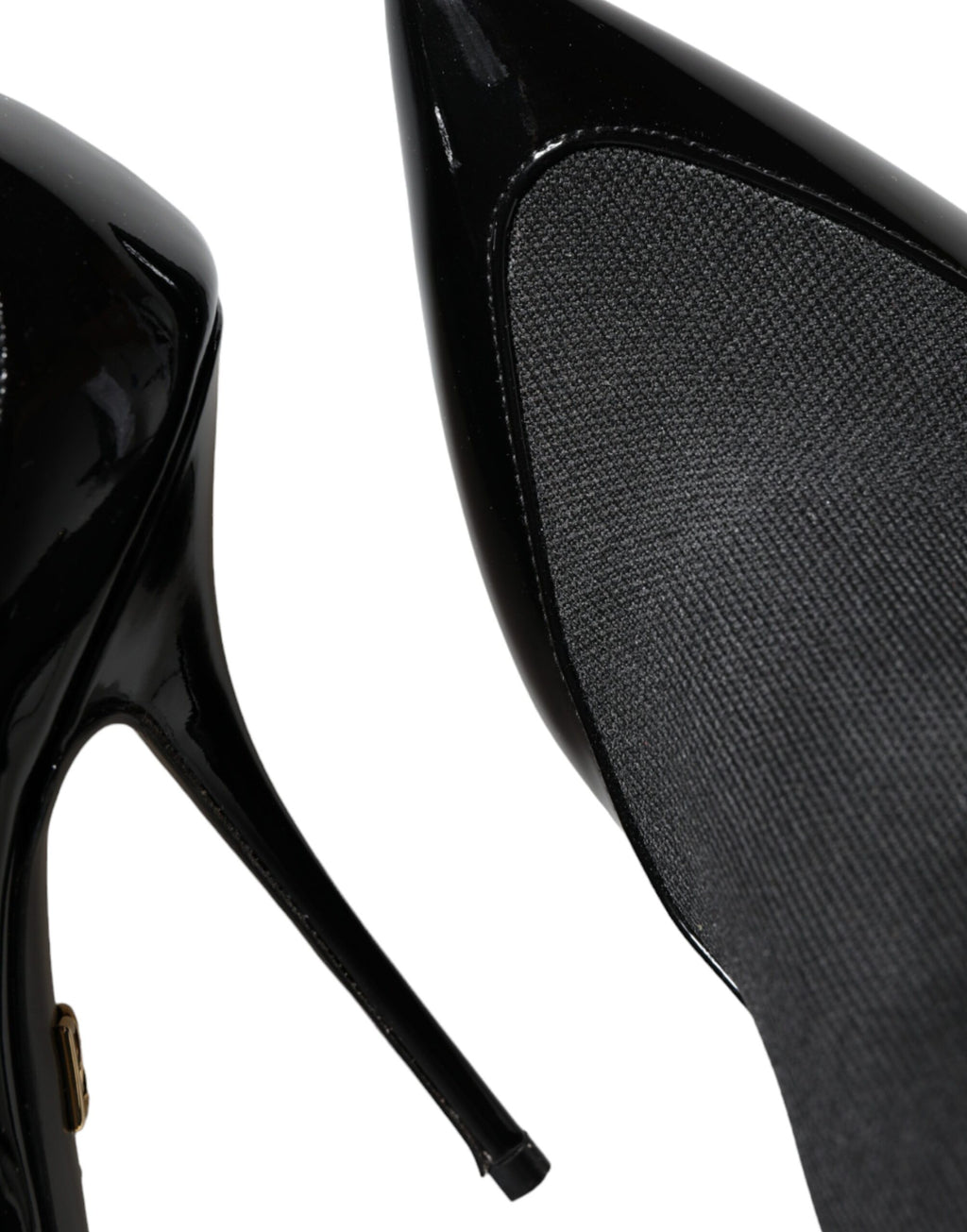 Chaussures Dolce & Gabbana en cuir noir, bottines stilettos avec chaussettes intégrées, élégantes et modernes.