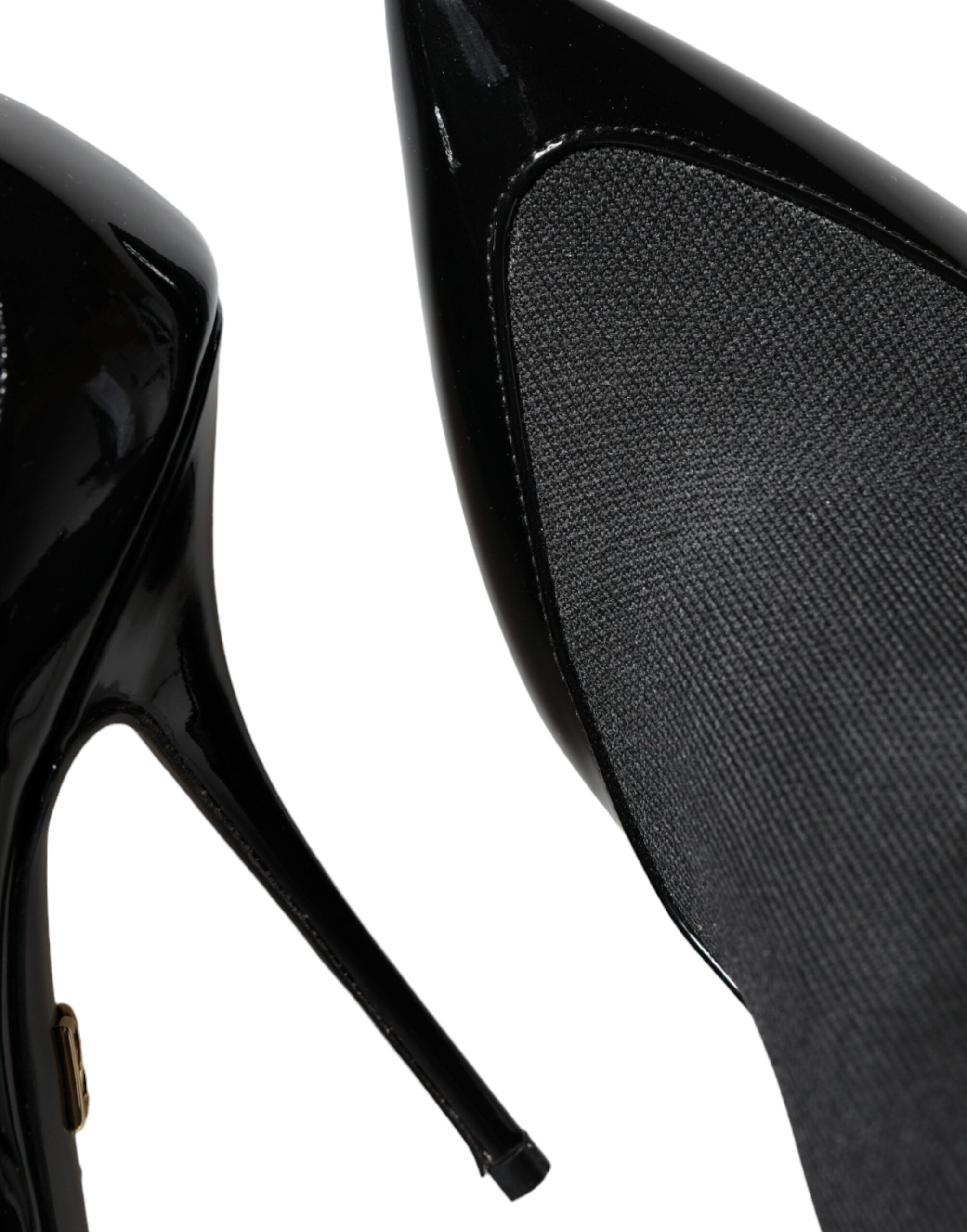 Chaussures Dolce & Gabbana en cuir noir, bottines stilettos avec chaussettes intégrées, élégantes et modernes.
