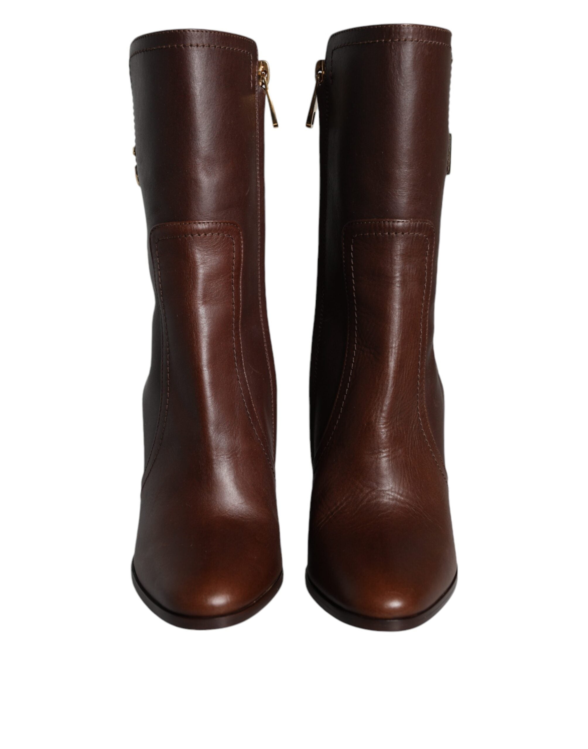 Chaussures Dolce & Gabbana bottines en cuir marron à mi-mollet, talons hauts élégants et sophistiqués.