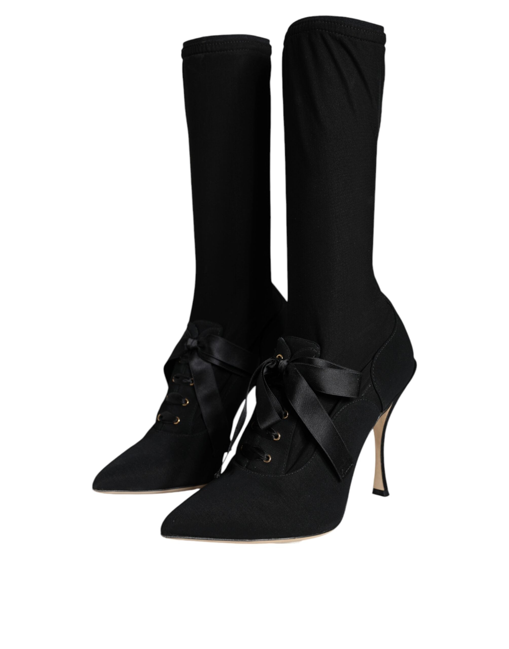 Chaussures Dolce & Gabbana, bottines noires à talons stilettos et mi-mollet, élégantes et sophistiquées.