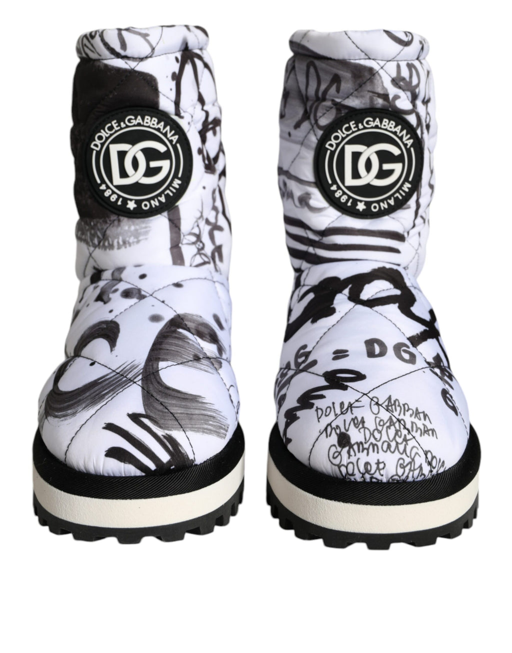 Bottes mi-mollet blanches Dolce & Gabbana avec logo imprimé rembourré, style élégant et moderne.
