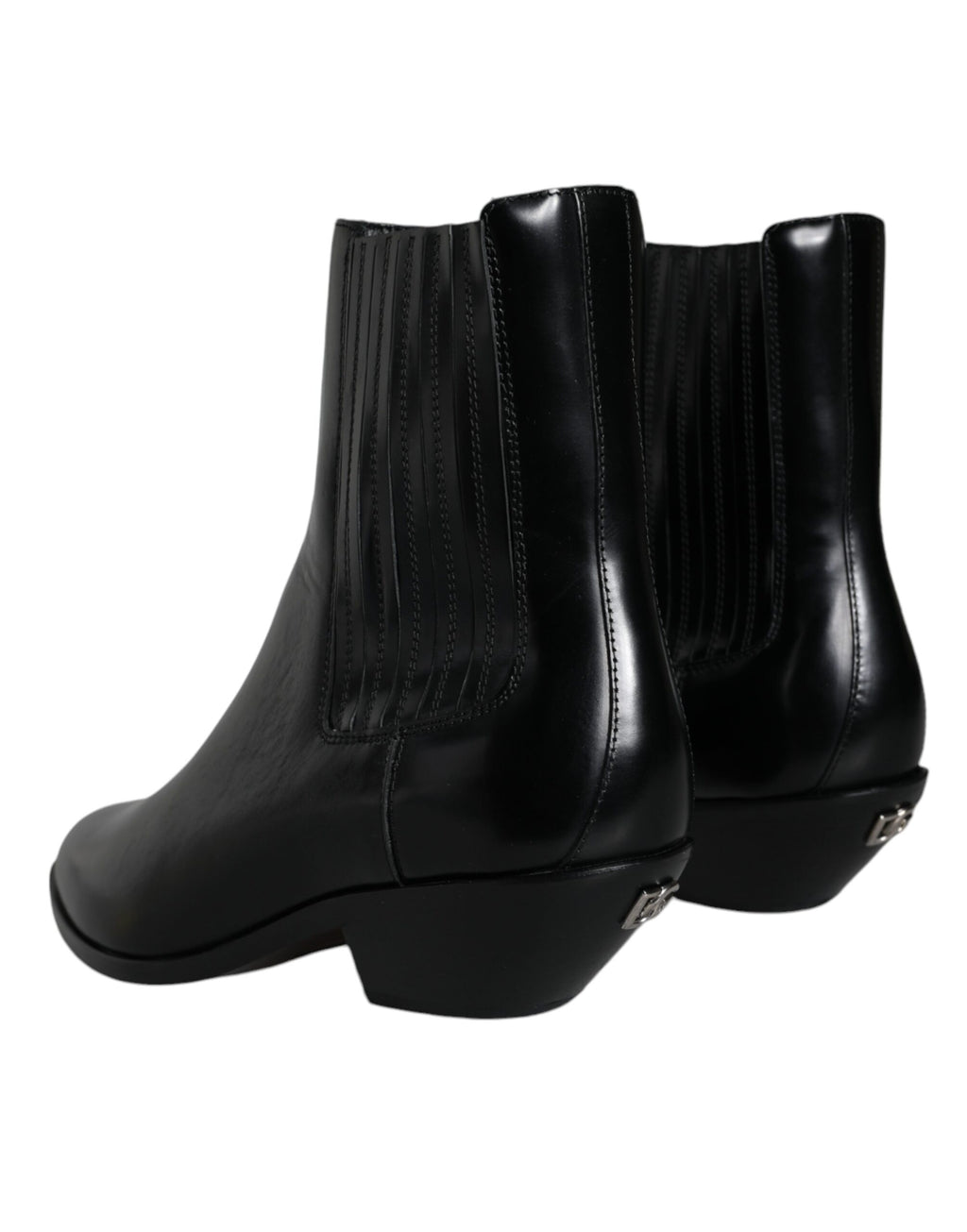 Bottines en cuir noir Dolce & Gabbana, chaussures à la cheville avec talon, style élégant et sophistiqué.