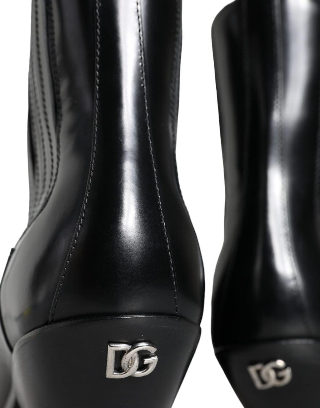 Bottines en cuir noir Dolce & Gabbana pour femme, chaussures élégantes à la cheville avec talon moyen.
