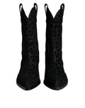 Bottes de cowboy Dolce & Gabbana en cuir noir et gris à motif léopard, style élégant et tendance.