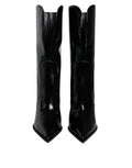 Chaussures bottines en cuir verni noir Dolce & Gabbana, mi-mollet, avec talons élégants et finition brillante.