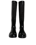Bottes hautes en caoutchouc noires à pois pour femmes de Dolce & Gabbana, style élégant et moderne.