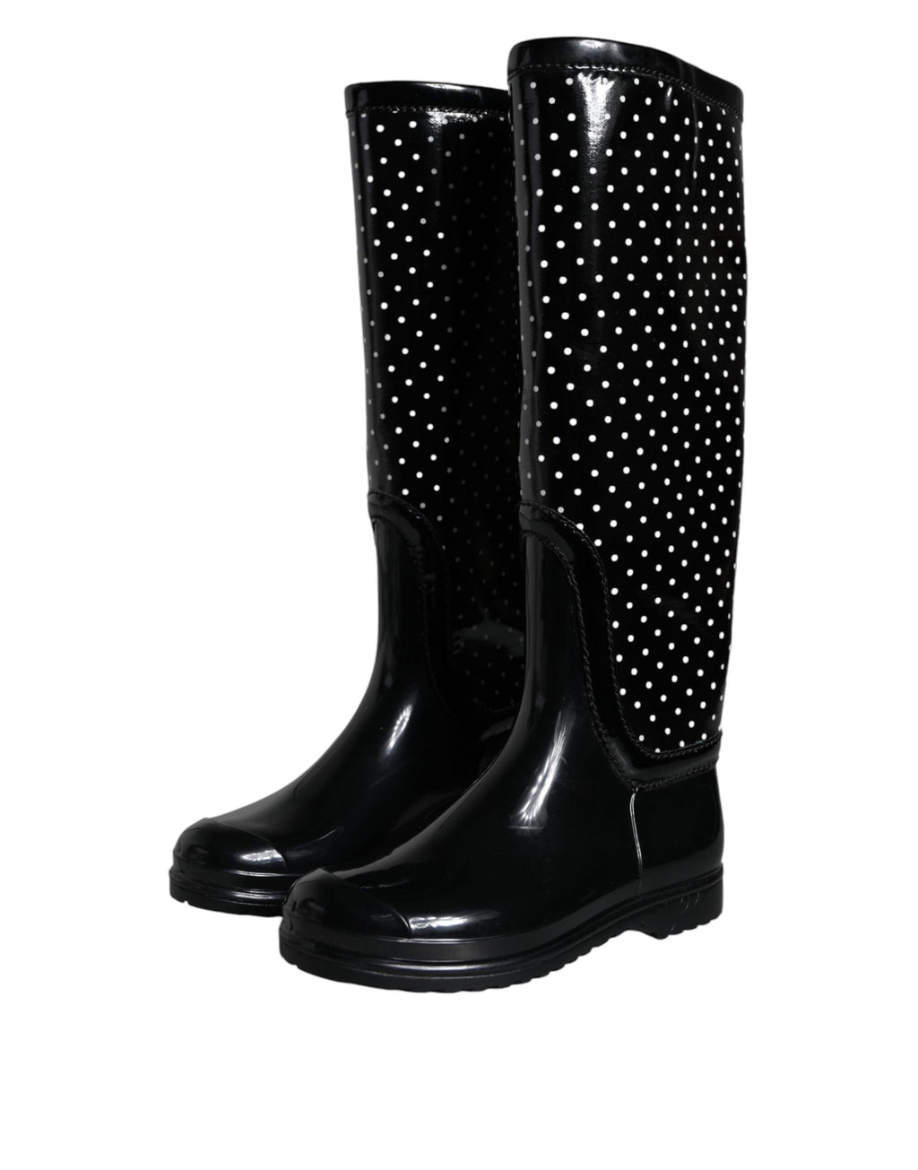 Bottes en caoutchouc noires à pois Dolce & Gabbana, bottes hautes jusqu'au genou avec motif à pois noirs et blancs.