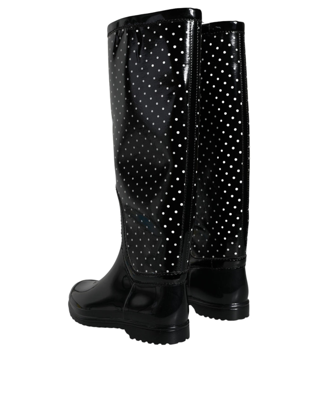 Bottes en caoutchouc noires à pois Dolce & Gabbana, bottes hautes élégantes avec motifs à pois noirs et blancs.
