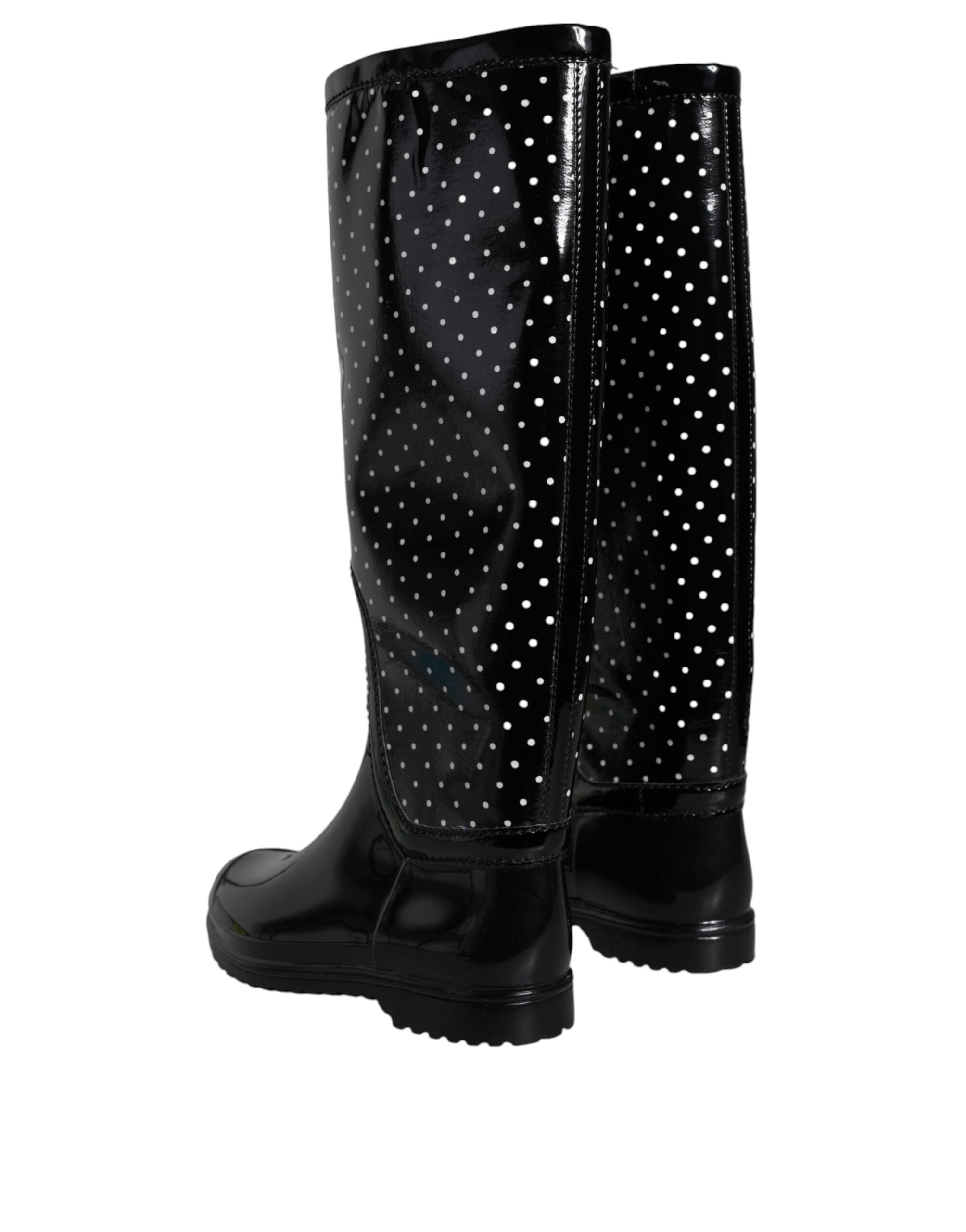 Bottes en caoutchouc noires à pois Dolce & Gabbana, bottes hautes élégantes avec motifs à pois noirs et blancs.