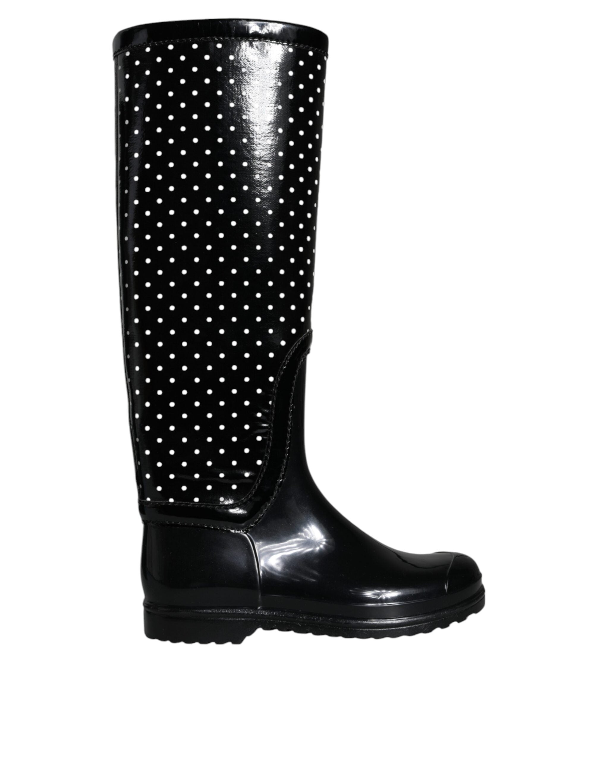 Bottes hautes en caoutchouc noires à pois Dolce & Gabbana, style élégant et moderne avec motif à pois noirs et détails en caoutchouc.