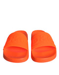 Sandales en caoutchouc orange Dolce & Gabbana, chaussures de plage confortables avec design tendance.
