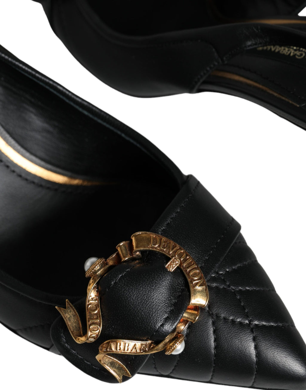 Chaussures à talons noires Dolce & Gabbana Devotion en cuir avec bride arrière, style élégant et sophistiqué.