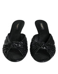 Sandales à talons noirs en cuir Dolce & Gabbana, chaussures élégantes avec bride large et design sophistiqué.
