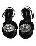 Sandales à talons noires Dolce & Gabbana avec bride à la cheville ornée de cristaux, élégantes et sophistiquées.