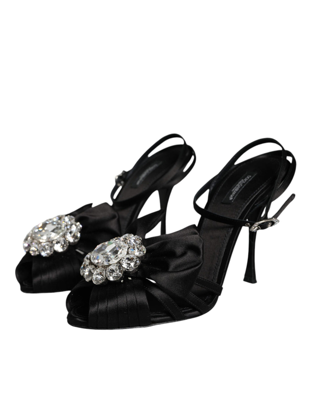 Sandales à talons dorés Dolce & Gabbana avec bride à la cheville ornée de cristaux noirs, vue de côté.