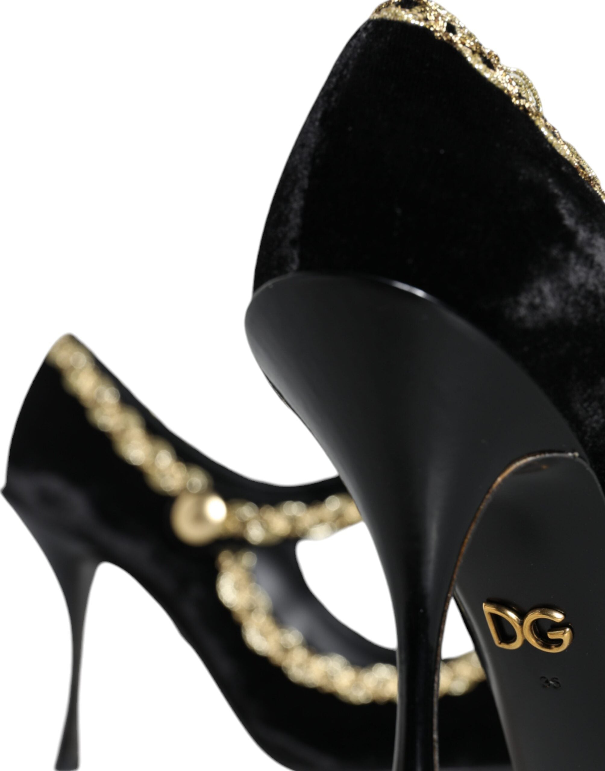 Chaussures Dolce & Gabbana Mary Janes noires en velours avec talons gold, style élégant et sophistiqué.
