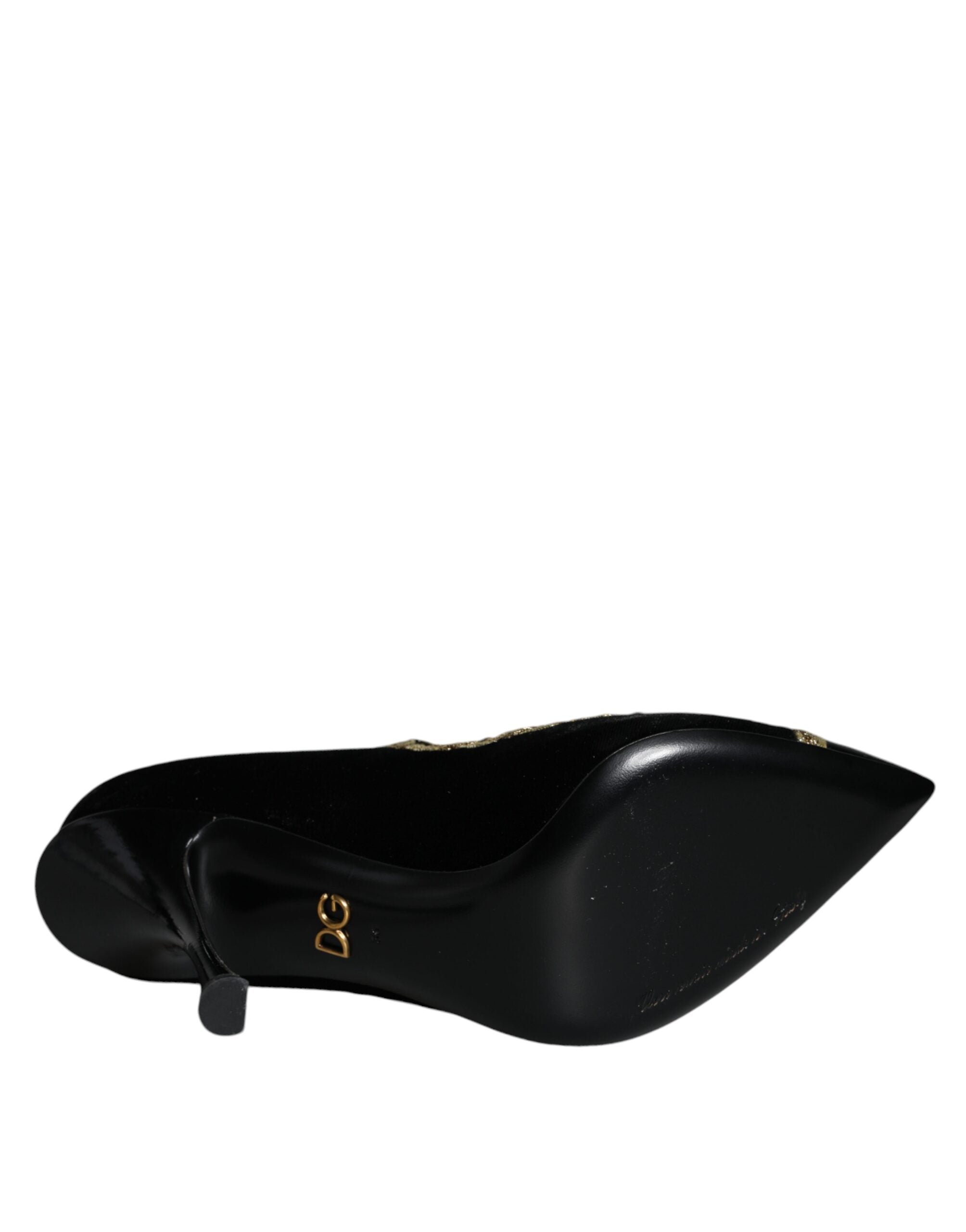 Chaussures Dolce & Gabbana Mary Janes noires en velours avec semelles dorées, élégantes et sophistiquées.