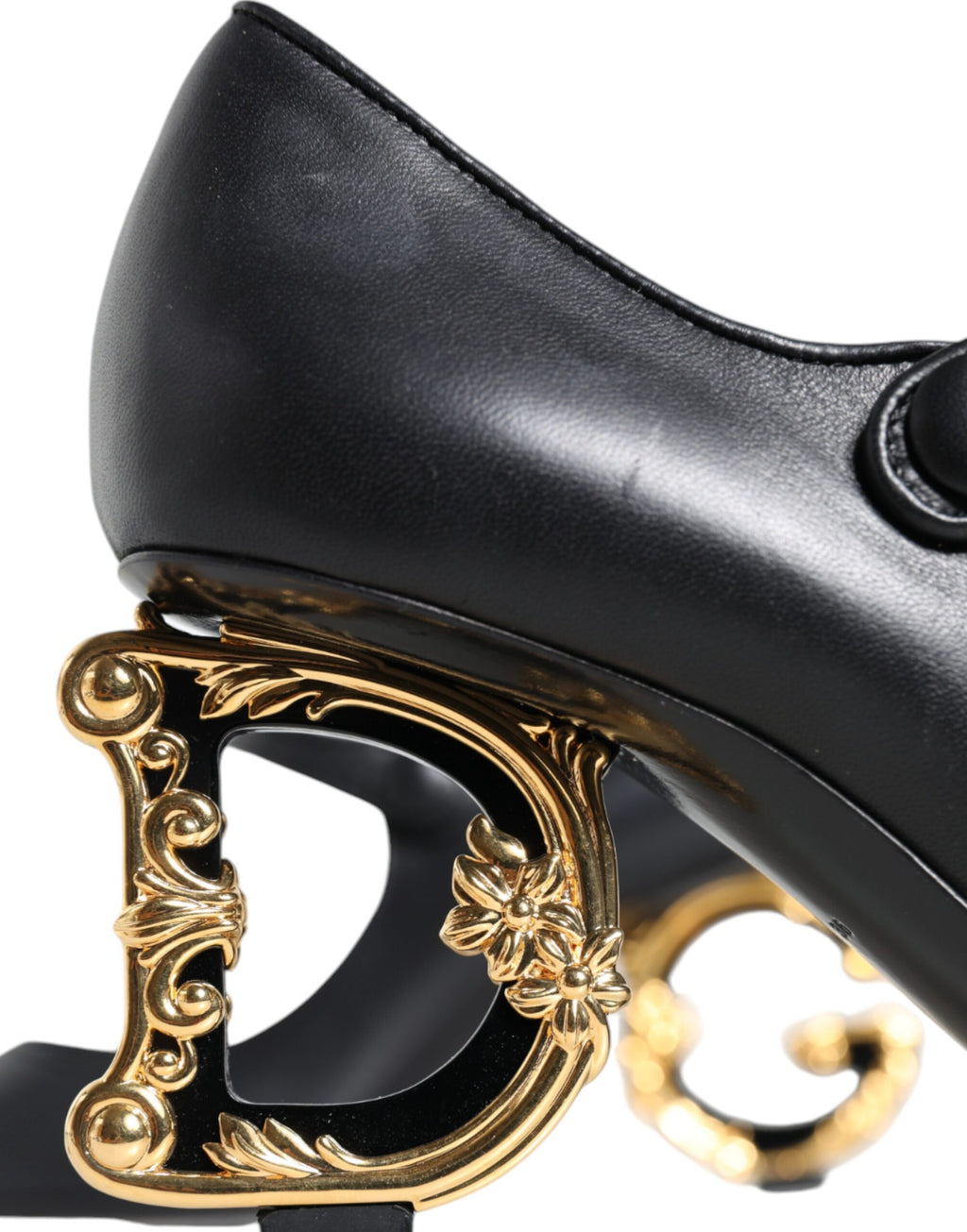Chaussures à talons Dolce & Gabbana en cuir noir, modèles Mary Janes avec logo élégant, élégantes et sophistiquées.