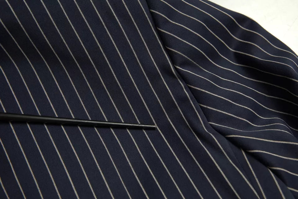Blazer à carreaux multicolores Dolce & Gabbana, coupe simple, à un seul rangée de boutons, élégant et tendance.