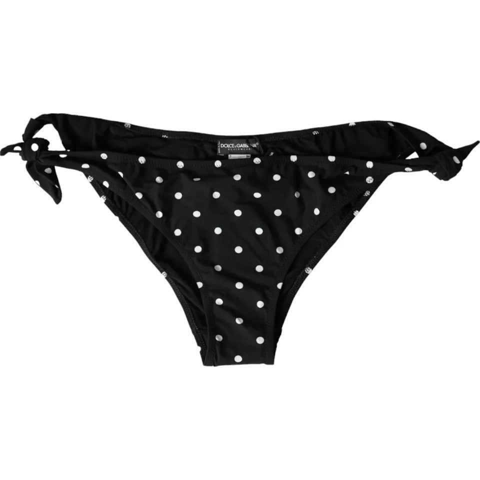 Bas de maillot de bain Dolce & Gabbana à pois noirs pour plage, en tissu léger et ajusté, parfait pour la baignade.