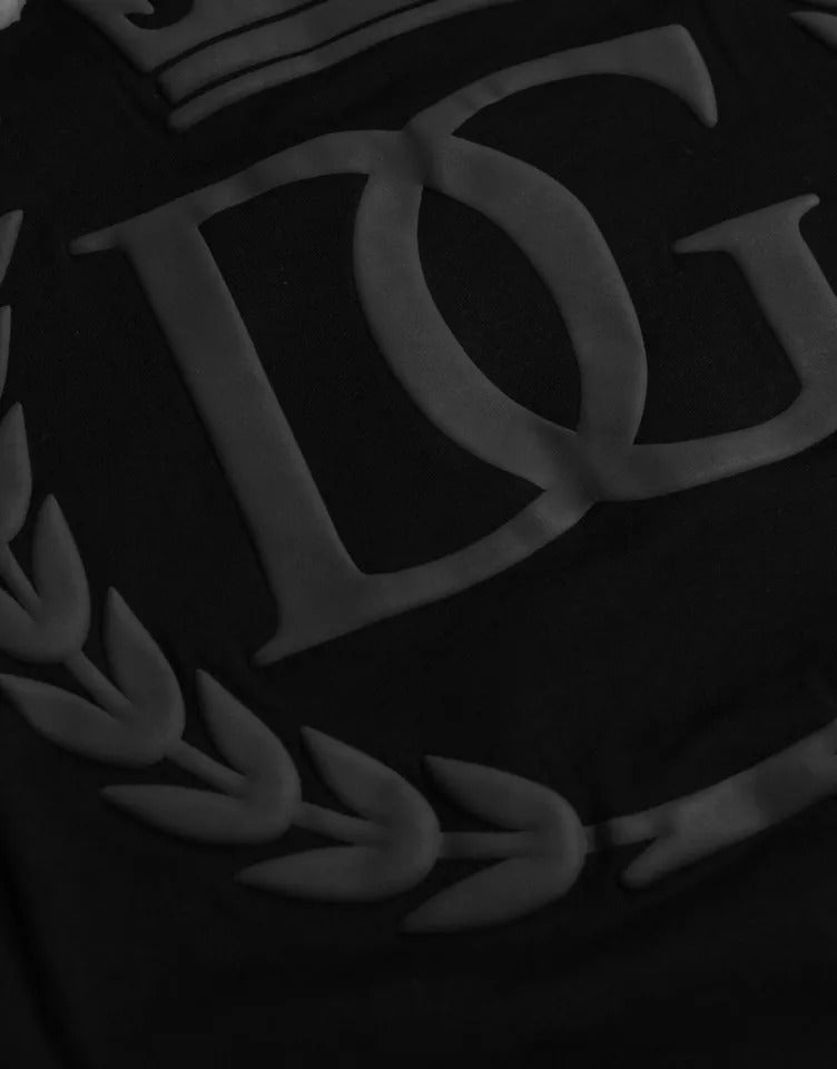 T-shirt en coton noir Dolce & Gabbana avec logo embossé, col rond, vue de face, détails du design visible.