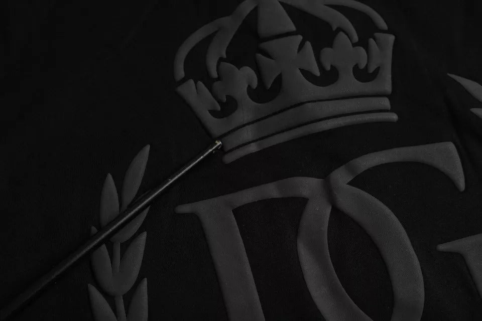 T-shirt en coton noir Dolce & Gabbana avec logo en relief, col rond, vue de face.