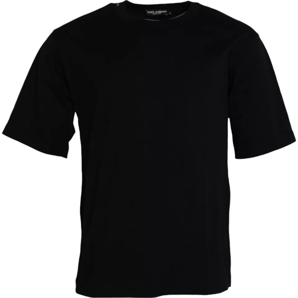 T-shirt en coton noir avec logo embossé de Dolce & Gabbana, col rond, style décontracté et élégant.