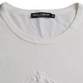 T-shirt blanc en coton Dolce & Gabbana avec logo embossé, col rond et style décontracté.