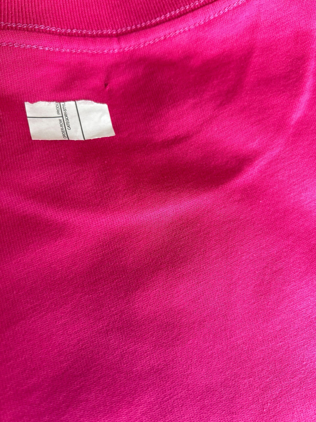 T-shirt rose en coton Balenciaga à col rond à manches courtes, mode élégante et confortable, vue de face.