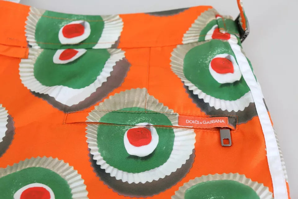 Shorts de bain Dolce & Gabbana Orange Cupcake Beachwear, maillot de bain avec motif coloré et style élégant pour la plage.