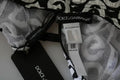 Maillot de bain sans manches Dolce & Gabbana DG Mania imprimé noir, style élégant et tendance pour la plage.