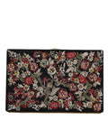 Pochette de soirée Dolce & Gabbana à motif floral multicolore avec cadre en or, sac élégant pour soirée.