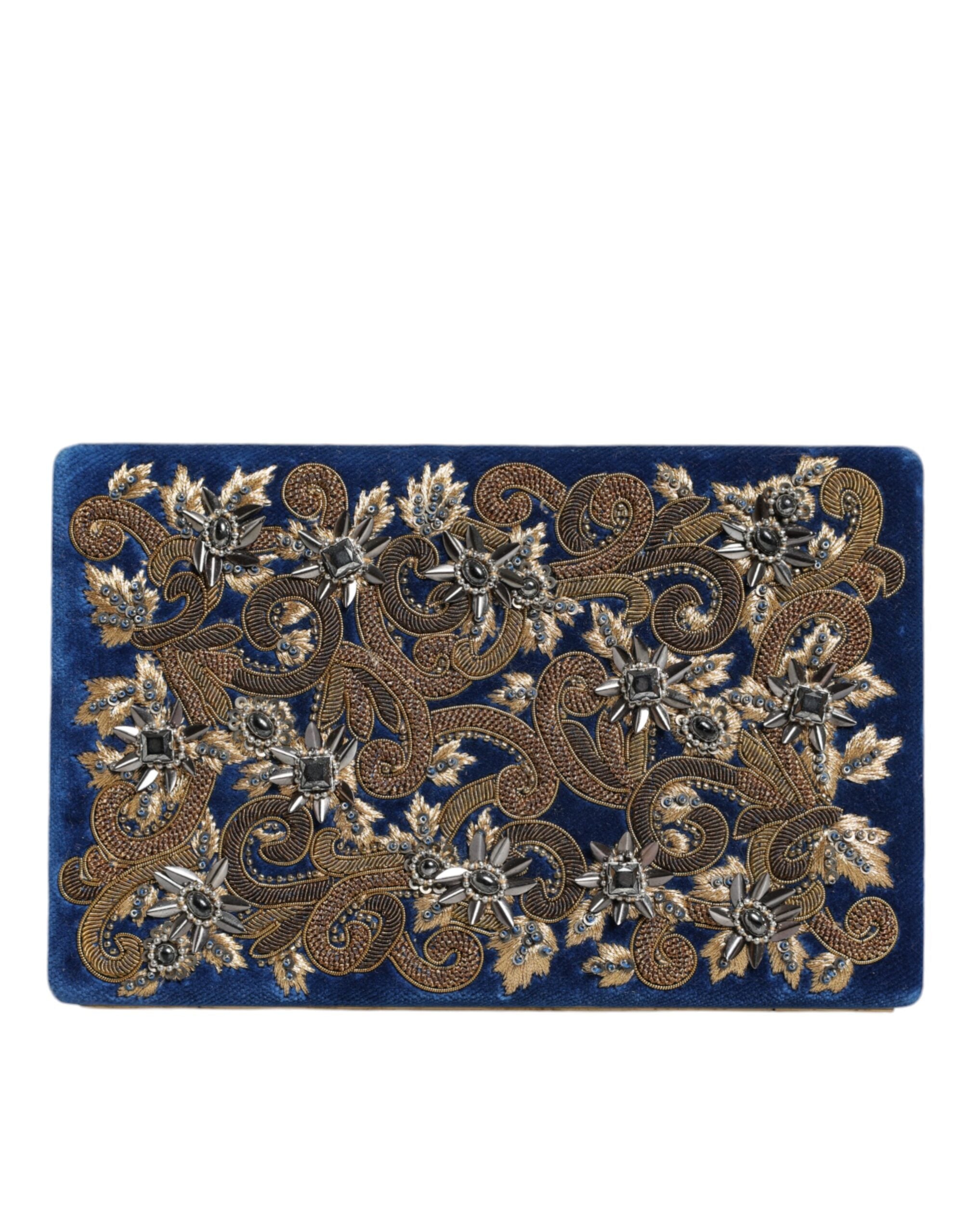 Sac pochette Dolce & Gabbana en velours bleu avec cadre en or, idéal pour soirée et événements élégants.