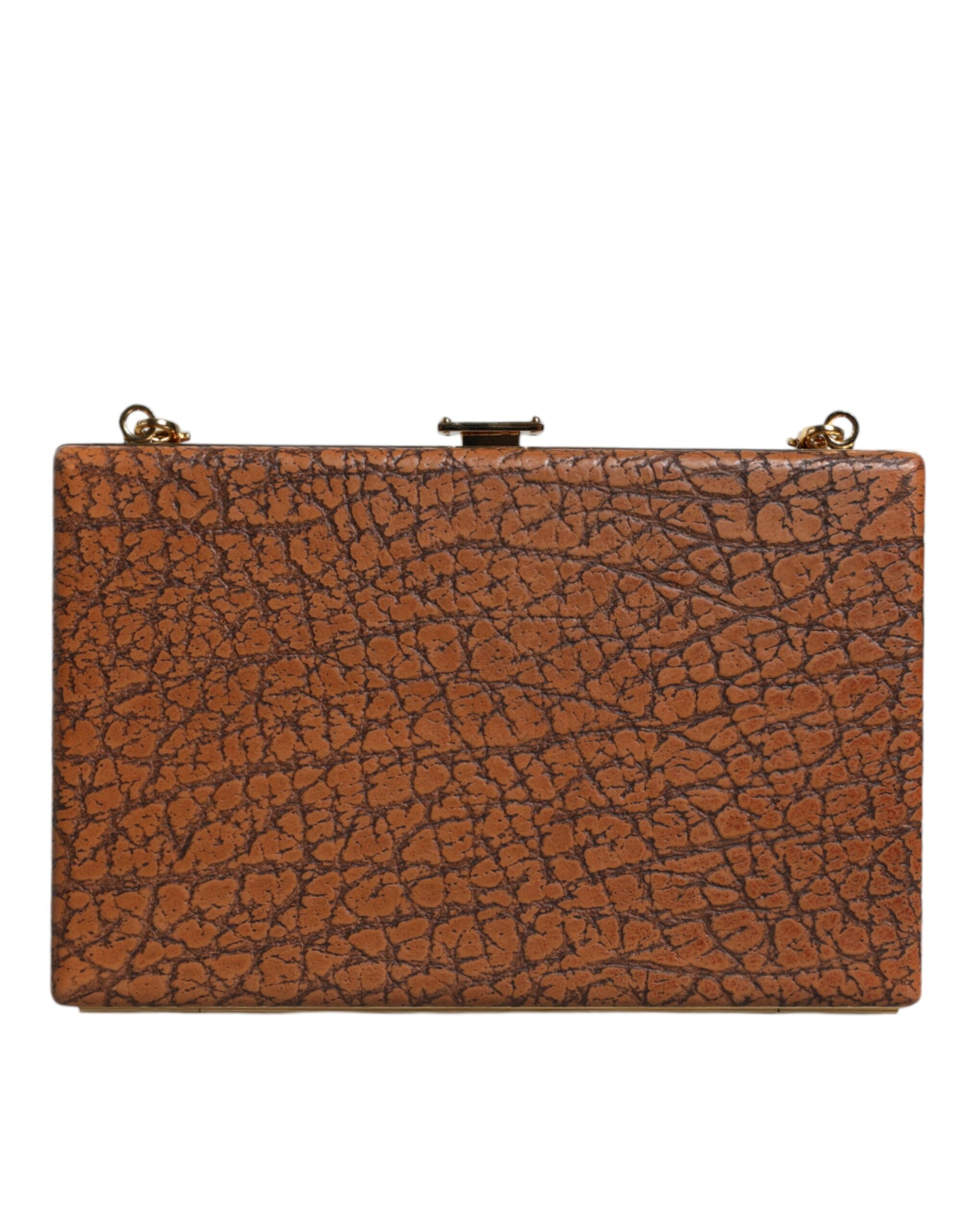 Sac clutch mini en cuir marron Dolce & Gabbana avec cadre doré, sac à bandoulière élégant et compact pour femme.