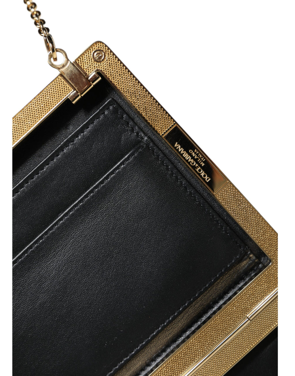 Sac clutch en cuir marron Dolce & Gabbana avec cadre doré, mini sac à bandoulière élégant et sophistiqué.