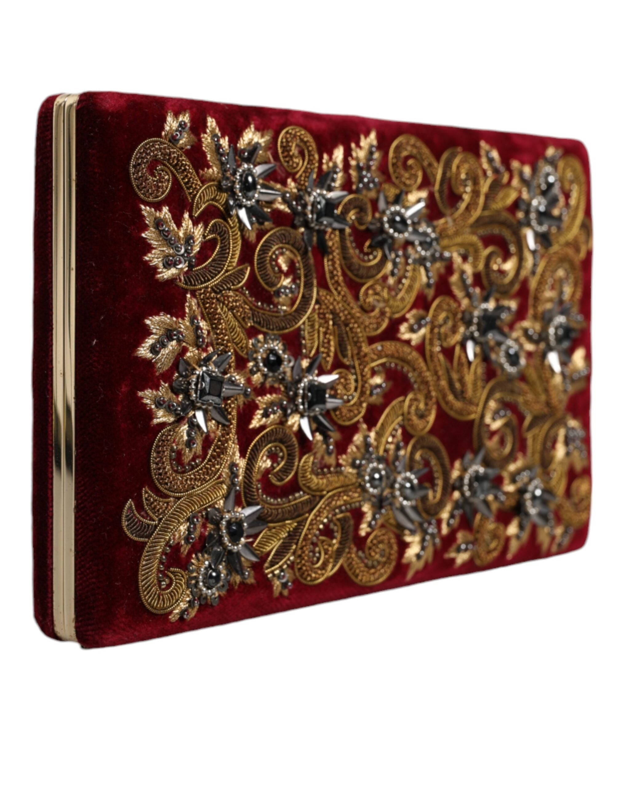 Sac pochette Dolce & Gabbana en velours rouge avec cadre en or, idéal pour soirée et fête.