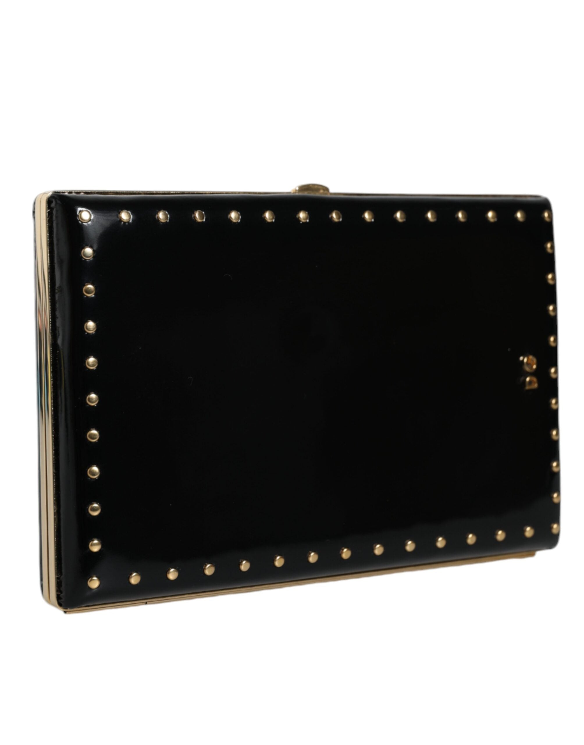 Sac clutch noir en cuir avec studs dorés et cadre en or, élégant sac de soirée de la marque Dolce & Gabbana.